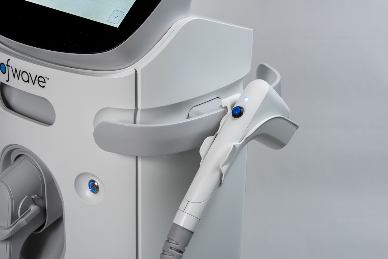 Close-up of a state-of-the-art ultrasound machine with focus on the handheld device, ideal for wrinkle reduction.